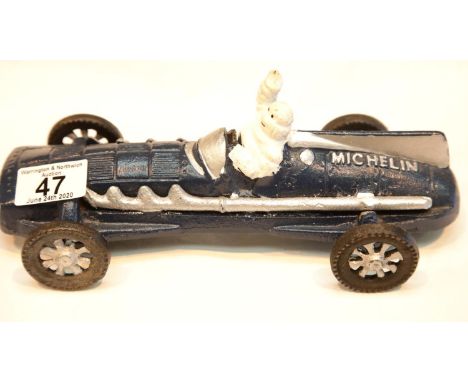 Cast iron Michelin Man racing car in blue, L: 27 cm. P&amp;P Group 2 (£18+VAT for the first lot and £2+VAT for subsequent lot