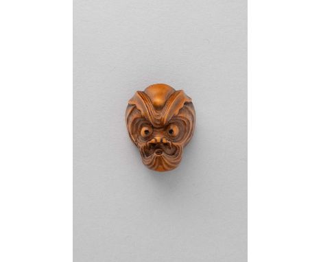 NO RESERVEA JAPANESE WOOD MASK NETSUKE OF AN OCTOPUS-USOFUKI  EDO/MEIJI, 19TH CENTURY  Depicted with wrinkly skin around bulg