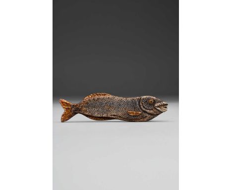 AN UNUSUAL JAPANESE NETSUKE OF A HIMONO (DRIED FISH)EDO PERIOD, 18TH/19TH CENTURYThe flattened desiccated fish is depicted ly