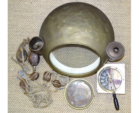 An Engine Room brass telegraph, (backing disc cracked through), a large brass binnacle cover, 59cm wide, a&nbsp;pair of enorm