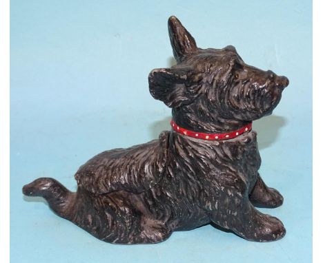 An Austrian cold-painted cast metal combination table lighter and ashtray in the form of a Highland Terrier, 10cm high, 13cm 
