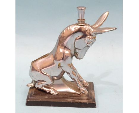 A chromium-plated table lighter in the form of a donkey, 14cm high, an Art Deco-style Ronson chrome-plated 'Dismal Desmond Do