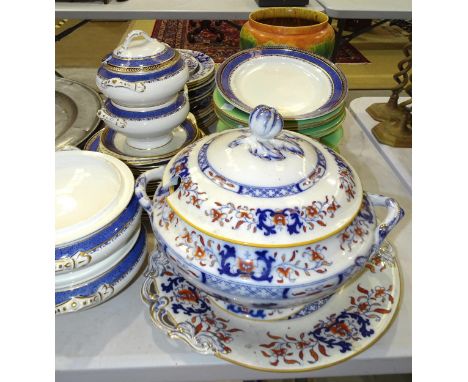 A quantity of 19th century Minton dinnerware: large tureen with ladle, on stand, and twenty-two plates of varying sizes, main