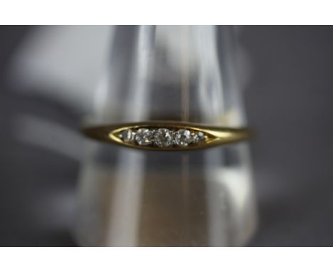 Gold ring (probably 18ct marks rubbed) set with 5 graduated diamonds, size U