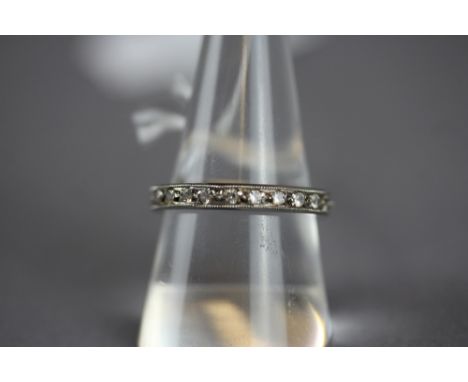 9ct white gold and white stone eternity ring, size Q