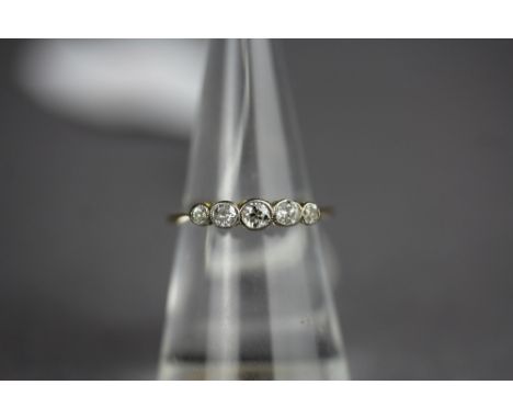 18ct gold diamond 5 stone ring size K largest approx 0.7cts