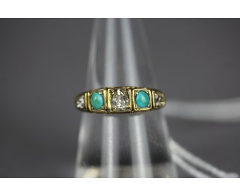 Yellow metal turquoise diamond ring