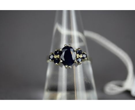 9ct white gold sapphire and diamond ring size O, largest stone approx 0.75