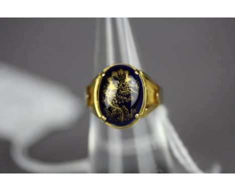 Yellow metal ring with Meissen oval cabochon (testing as high carat gold)