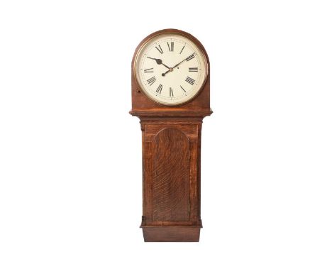 A large and impressive 19th-century drop dial tavern/ Station regulator timepiece, with an arched hood and trunk door, with a