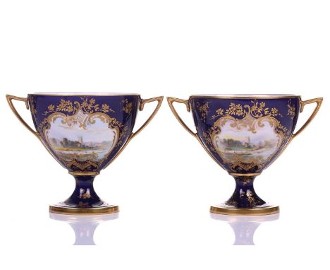 A pair of early 20th century Royal Worcester Bleu de Roi porcelain twin-handled sweetmeat urns, painted with scenes of Worces