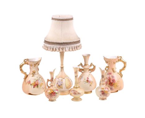 A collection of early 20th century Royal Worcester blush ivory ceramics, each with floral decoration, comprising two jugs, sh