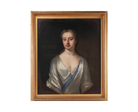 Manner of Sir Godfrey Kneller (1646-1723), half length portrait of a lady in white and blue, unsigned, oil on canvas, 72 x 60