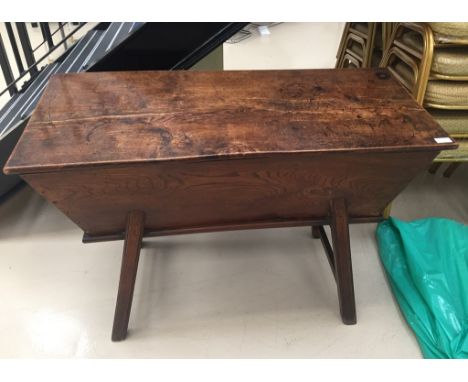 An 18th century elm & oak dough trough & lid