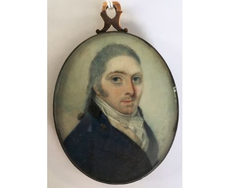 Circle of George Place (Irish, c.1755-c.1805/09):A portrait miniature of a gentleman in a blue jacket & white cravat, signed 