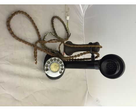  A candlestick telephone