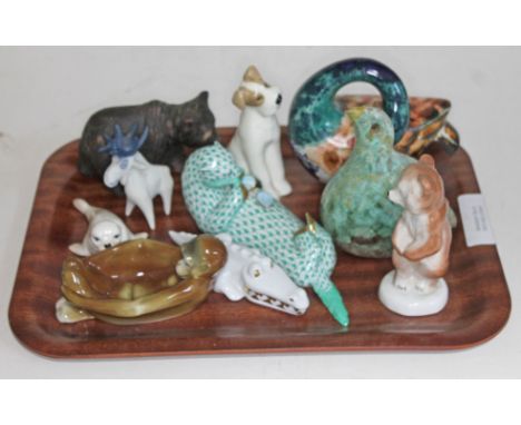 A group of 10 animal ornaments including a Sitzendorf dish formed as a monkey with arms around knees, a Szeiler seal pup, a F