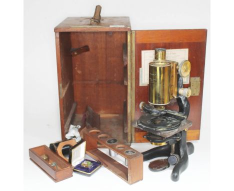 A Watson &amp; Son "Bactil" microscope boxed with accessories, previously belonging to Stanley Charles Simmens, reputedly the