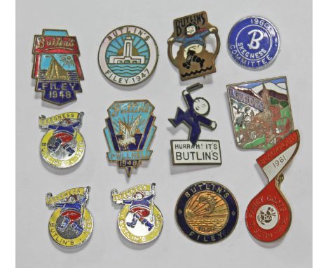 A group of 10 vintage Butlin's enamel badges and two others.  