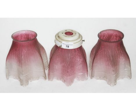 A set of three etched cranberry glass light shades, height approx 6 inches.  