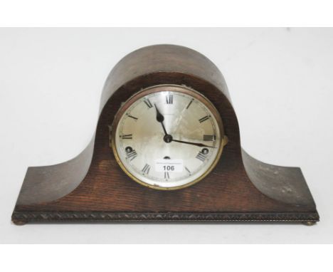 A domed mantle clock with steel dial.  