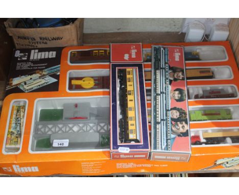 A collection of trains to include boxed Lima, Lima HO scale set, transformer.  