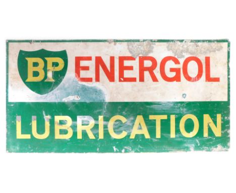 A BP painted metal advertising sign, stamped BP Energol Lubrication, on a green and cream ground, 23cm x 104cm. (AF)