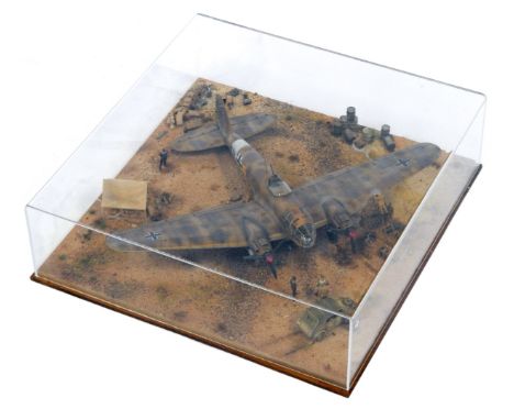 A 1:48 scale cased diorama model Heinkel HE III Bomber, North Africa 1942, 14cm high, 44cm wide, 44cm deep. 