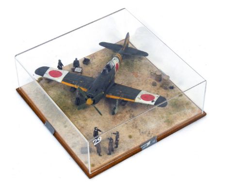 A 1:32 scale cased diorama model of a Nakajima Hayate Ki-84, Frank WWII fighter, 13cm high, 34cm wide, 34cm deep. 