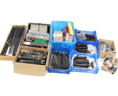 OO gauge track, points, Trix twin railway track, tin plate clock work locomotive spares, etc. (a quantity)