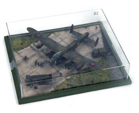 A 1:72 scale cased diorama model of an RAF Lancaster Bomber, circa 1944, 12cm high, 46cm wide, 40cm deep. 