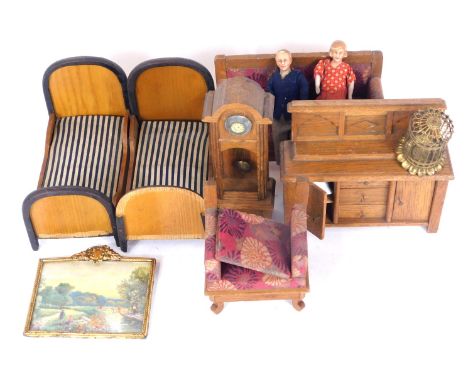 Large scale doll's house furniture, comprising two single beds, sofa and armchair, picture frame, sideboard and a long cased 