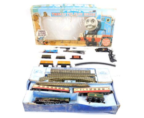 A Hornby OO gauge Thomas The Tank Engine electric train set, together with a further Hornby OO gauge train set containing a l