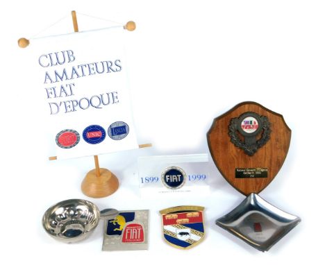 A collection of Fiat collectables, comprising a Fiat ashtray, a Fiat 1899-1999 paperweight, and a Club Amateurs d'Epoque bann