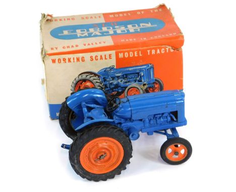 A Chad Valley diecast model of a New Fordson Major tractor, blue, boxed.