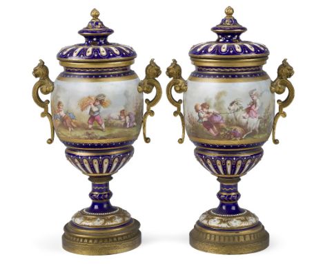 A pair of Sevres-style gilt-bronze mounted pot-pourri vases and covers, late 19th century, the bodies decorated with children