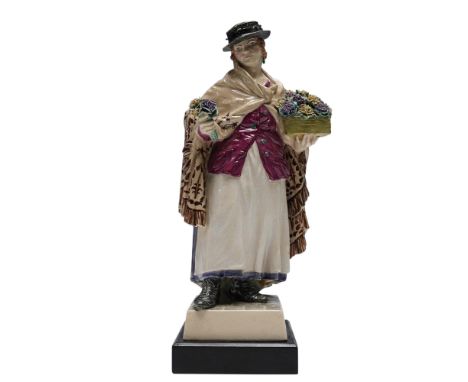Chelsea Pottery figure of 'The Shawl', on an ebonised plinth,Literature: Referenced in Terence Cartlidge, 'Charles and Nell V