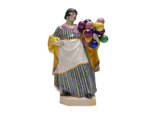 Chelsea Pottery  an earthenware figure of 'The Balloon Woman', painted marks,Literature: Terence Cartlidge, 'Charles and Nell