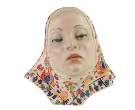 Designed by Italian ceramic artist Elena (Helen) Konig Scavini (1886-1974). The figure portrays a stylized woman with a seren