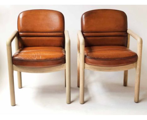 GORDON RUSSELL ARMCHAIRS, a pair, 1970's stitched hand finished, light brown leather and washed ash frame, 58cm W. (2)