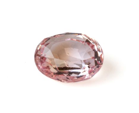 A LOOSE 1.55 CARAT PADPARADSCHA SAPPHIRE
The oval padparadscha sapphire, accompanied by a Nan Yang Gemological Institute Gems