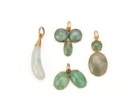 A GROUP OF FOUR JADE PENDANTS
The various jade pendants mounted on unmarked yellow gold settings
4.8g
Provenance: Property fr