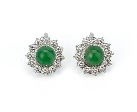 A PAIR OF JADE AND DIAMOND CLUSTER CLIP EARRINGS
To be sold at no reserve
The circular cabochon within a surround of round br