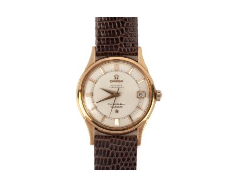 AN OMEGA GOLD CONSTELLATION CALENDAR AUTOMATIC WRISTWATCH
Ref.14393/4, circa 1969
The cream dial with baton hour markers, dat
