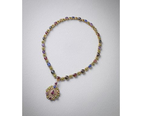 A late 19th century coloured gemstone set necklace and pendant, the necklace formed with graduated gemstones each set in a go