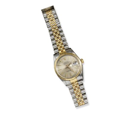 A gentleman's oyster perpetual Datejust gold and steel wristwatch by Rolex, automatic winding. The signed vertically striated