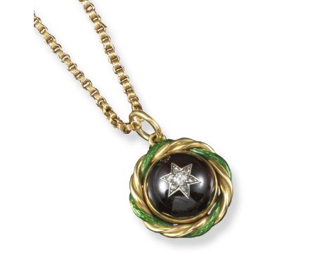 A garnet and diamond pendant by John Brogden, the circular garnet cabochon centred with a diamond-set star and mounted in a g