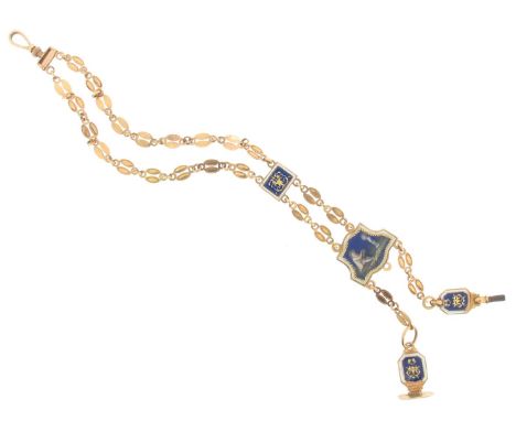 A French gold 18th century chatelaine, with gold fancy links, an upper rectangular link with blue and white enamel decoration