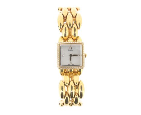 A lady's Omega Sapphette 18ct gold wristwatch, 1.8cm wide, numbered 55153280. The signed square shell dial with diamond-set b