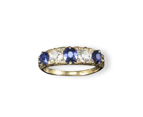 A late Victorian sapphire and diamond five stone ring, set with three oval-shaped sapphires and two cushion-shaped diamonds. 